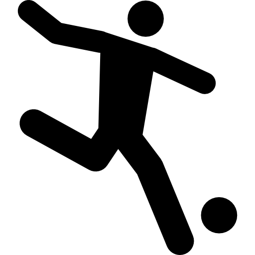 Football player running behind the ball